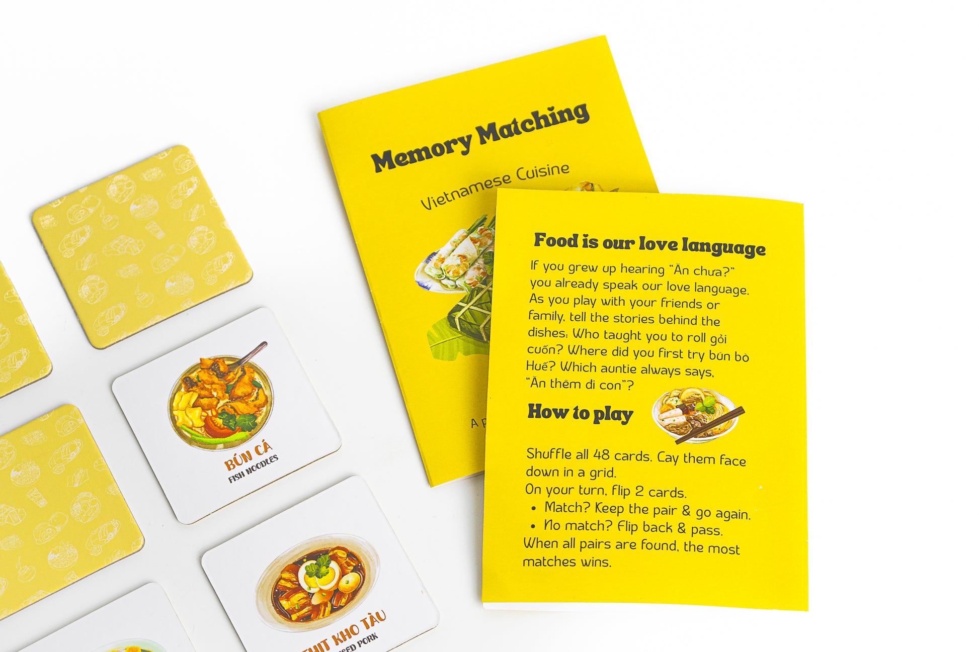 Close-up of bilingual labels Vietnamese–English on memory tiles