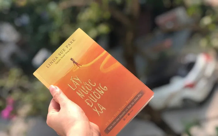 Lấy nước đường xa (A long walk to water in Vietnamese)